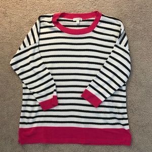 Black & white striped sweater with pink accents